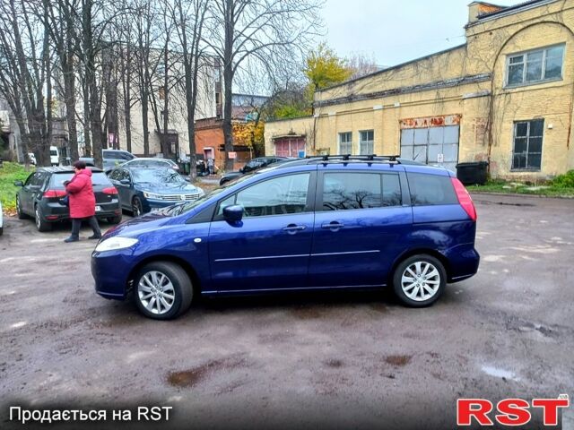 Синий Мазда 5, объемом двигателя 1.8 л и пробегом 300 тыс. км за 5400 $, фото 10 на Automoto.ua
