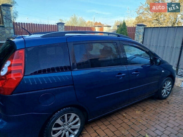 Синий Мазда 5, объемом двигателя 2 л и пробегом 260 тыс. км за 5000 $, фото 2 на Automoto.ua