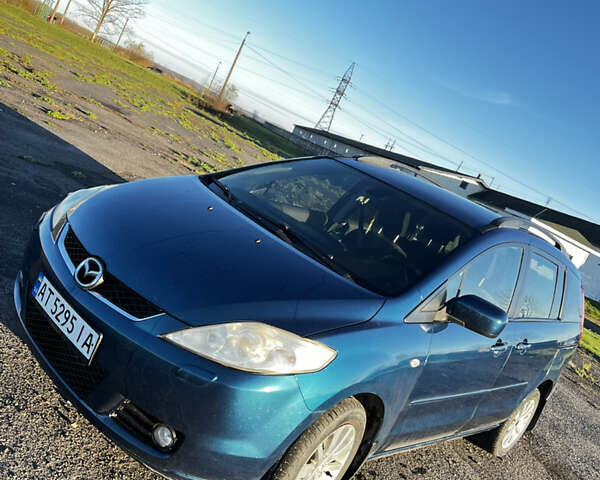 Синий Мазда 5, объемом двигателя 2 л и пробегом 215 тыс. км за 5500 $, фото 3 на Automoto.ua