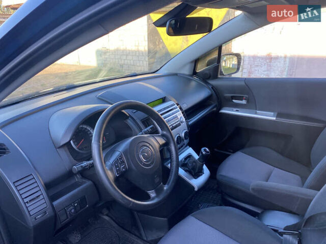 Синий Мазда 5, объемом двигателя 2 л и пробегом 260 тыс. км за 3900 $, фото 4 на Automoto.ua