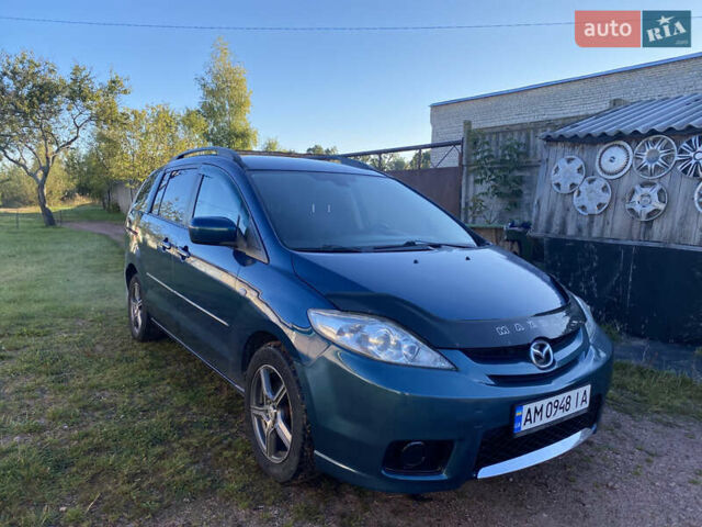 Синий Мазда 5, объемом двигателя 2 л и пробегом 260 тыс. км за 3900 $, фото 1 на Automoto.ua
