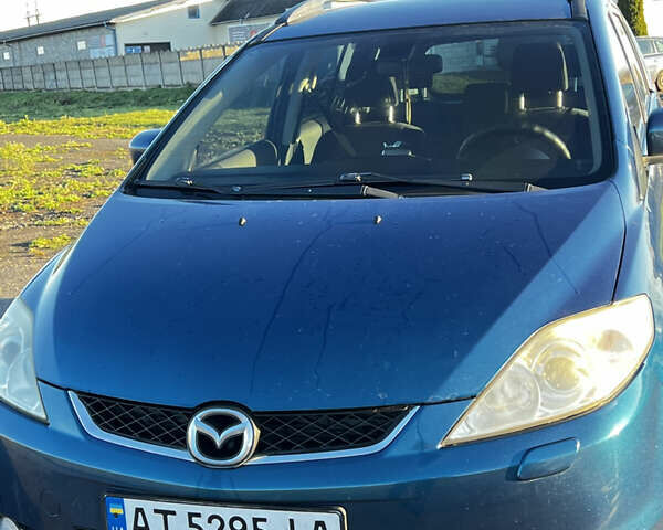 Синий Мазда 5, объемом двигателя 2 л и пробегом 215 тыс. км за 5500 $, фото 1 на Automoto.ua