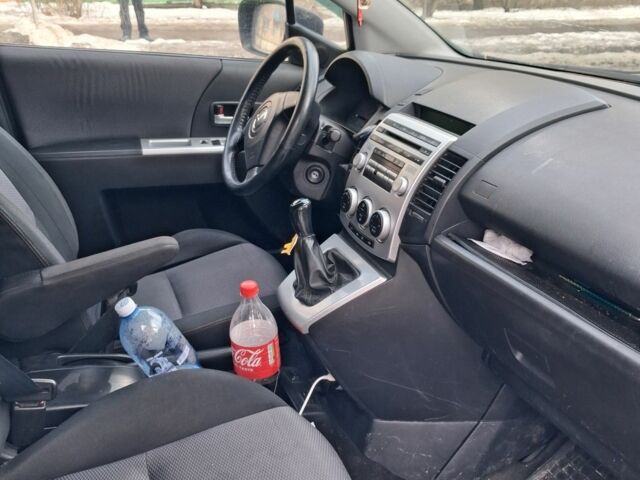 Синій Мазда 5, об'ємом двигуна 2 л та пробігом 250 тис. км за 4630 $, фото 2 на Automoto.ua