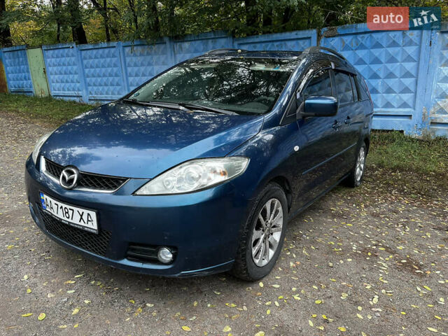 Синій Мазда 5, об'ємом двигуна 2 л та пробігом 229 тис. км за 4900 $, фото 4 на Automoto.ua