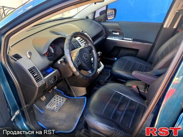 Синий Мазда 5, объемом двигателя 2 л и пробегом 299 тыс. км за 5005 $, фото 4 на Automoto.ua