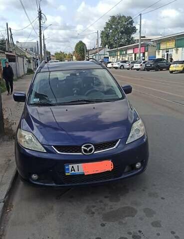 Синий Мазда 5, объемом двигателя 2 л и пробегом 250 тыс. км за 5100 $, фото 1 на Automoto.ua