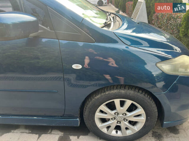 Синий Мазда 5, объемом двигателя 2 л и пробегом 250 тыс. км за 5500 $, фото 5 на Automoto.ua