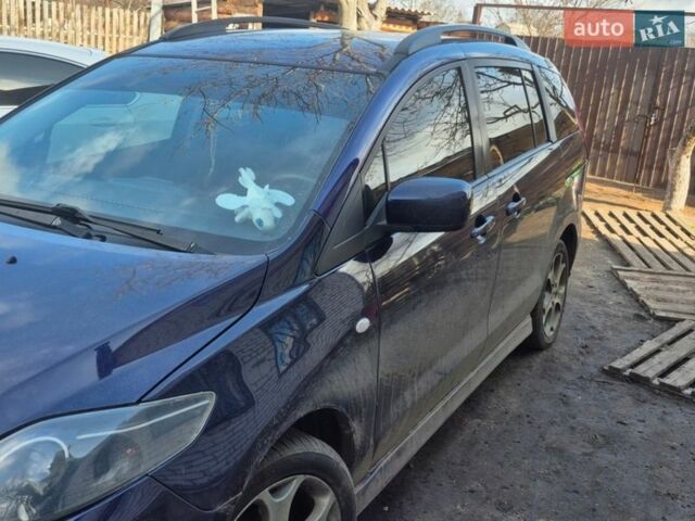 Синий Мазда 5, объемом двигателя 1.8 л и пробегом 230 тыс. км за 5700 $, фото 2 на Automoto.ua