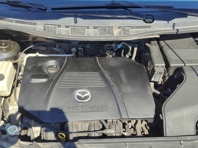 Синий Мазда 5, объемом двигателя 1.8 л и пробегом 220 тыс. км за 5999 $, фото 6 на Automoto.ua