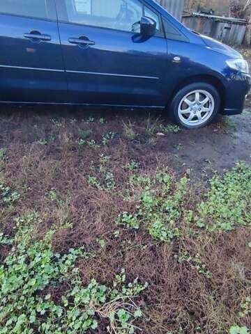 Синий Мазда 5, объемом двигателя 2 л и пробегом 322 тыс. км за 5700 $, фото 5 на Automoto.ua