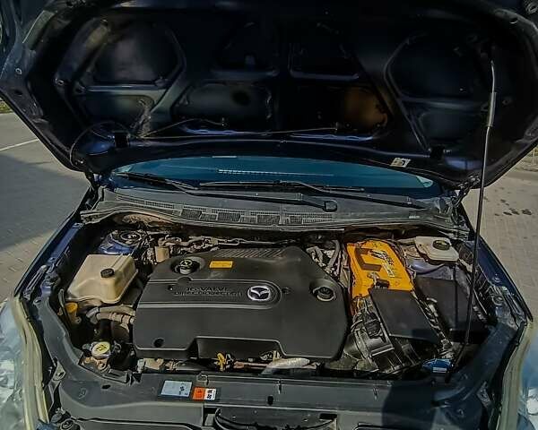Синій Мазда 5, об'ємом двигуна 2 л та пробігом 255 тис. км за 5800 $, фото 15 на Automoto.ua