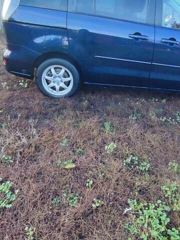 Синий Мазда 5, объемом двигателя 2 л и пробегом 322 тыс. км за 5700 $, фото 3 на Automoto.ua