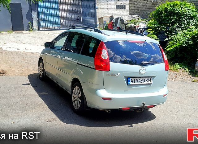 Синий Мазда 5, объемом двигателя 2 л и пробегом 350 тыс. км за 4200 $, фото 1 на Automoto.ua