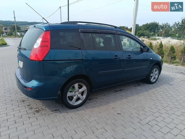 Синий Мазда 5, объемом двигателя 2 л и пробегом 255 тыс. км за 5500 $, фото 4 на Automoto.ua
