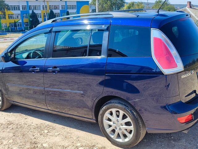Синий Мазда 5, объемом двигателя 1.8 л и пробегом 220 тыс. км за 5999 $, фото 1 на Automoto.ua
