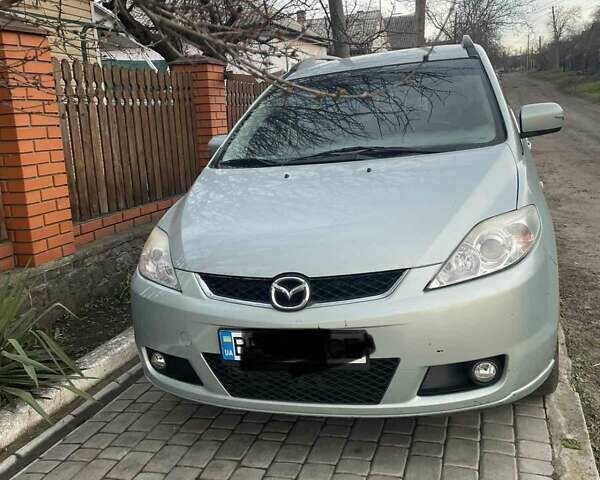 Синий Мазда 5, объемом двигателя 2 л и пробегом 200 тыс. км за 6200 $, фото 2 на Automoto.ua