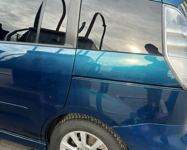 Синий Мазда 5, объемом двигателя 2 л и пробегом 250 тыс. км за 5500 $, фото 2 на Automoto.ua