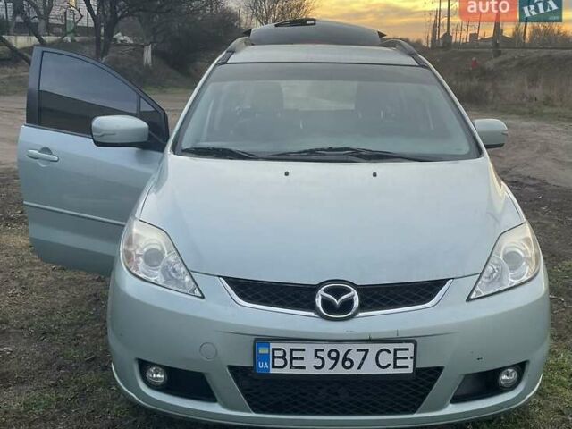 Синий Мазда 5, объемом двигателя 2 л и пробегом 200 тыс. км за 6200 $, фото 1 на Automoto.ua