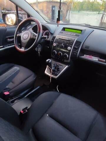 Синий Мазда 5, объемом двигателя 2 л и пробегом 322 тыс. км за 5700 $, фото 2 на Automoto.ua