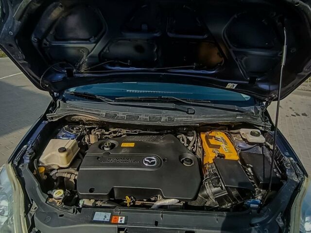 Синий Мазда 5, объемом двигателя 2 л и пробегом 285 тыс. км за 4014 $, фото 15 на Automoto.ua