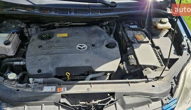Синий Мазда 5, объемом двигателя 2 л и пробегом 293 тыс. км за 4800 $, фото 8 на Automoto.ua