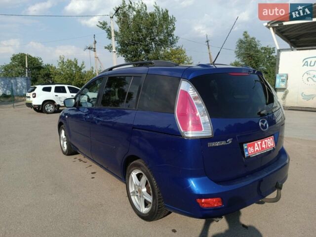 Синий Мазда 5, объемом двигателя 1.8 л и пробегом 242 тыс. км за 5600 $, фото 5 на Automoto.ua
