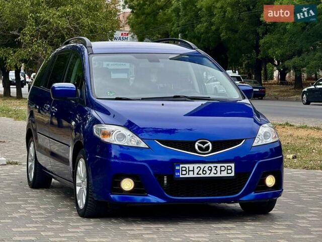 Синий Мазда 5, объемом двигателя 2 л и пробегом 285 тыс. км за 5999 $, фото 2 на Automoto.ua