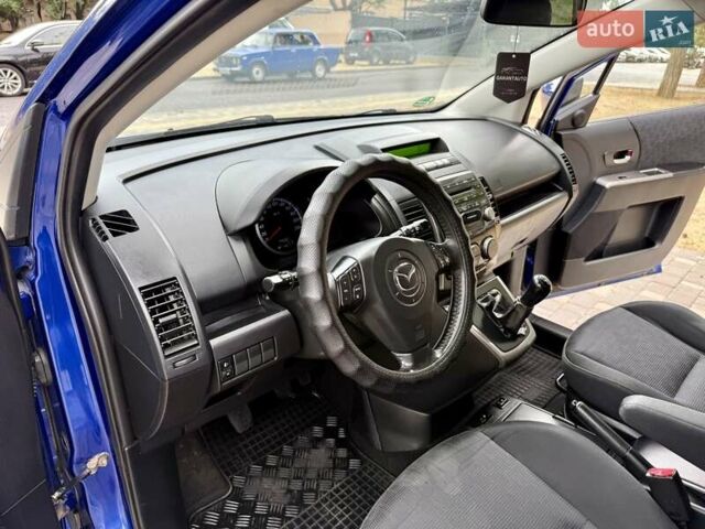 Синий Мазда 5, объемом двигателя 2 л и пробегом 285 тыс. км за 5999 $, фото 39 на Automoto.ua