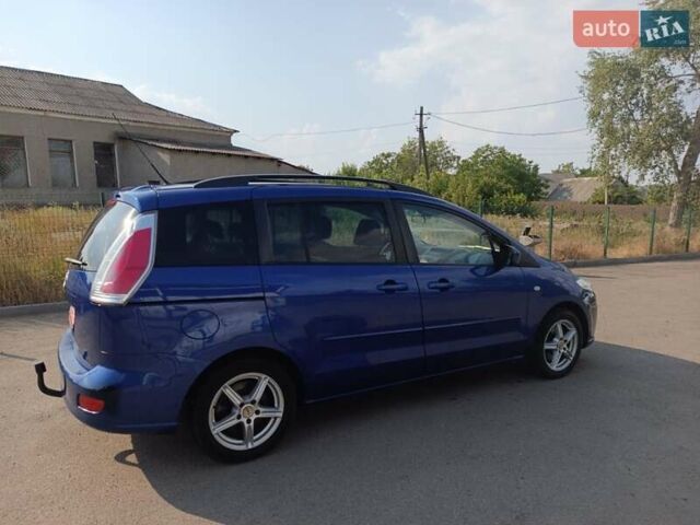 Синий Мазда 5, объемом двигателя 1.8 л и пробегом 241 тыс. км за 6100 $, фото 3 на Automoto.ua