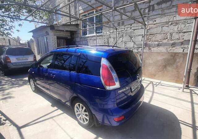 Синий Мазда 5, объемом двигателя 2 л и пробегом 300 тыс. км за 5900 $, фото 5 на Automoto.ua