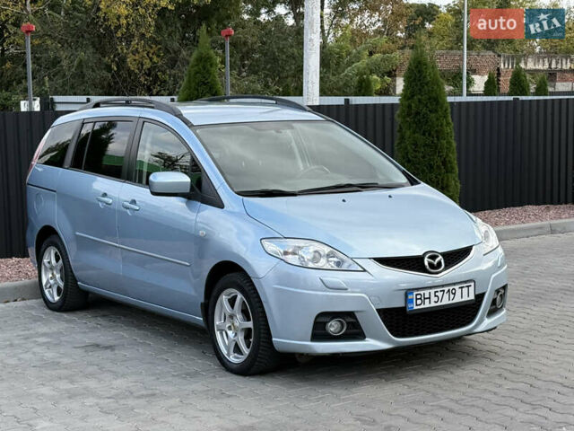 Синий Мазда 5, объемом двигателя 2 л и пробегом 217 тыс. км за 5950 $, фото 3 на Automoto.ua