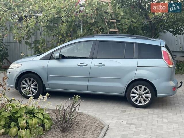 Синий Мазда 5, объемом двигателя 2 л и пробегом 243 тыс. км за 6000 $, фото 1 на Automoto.ua