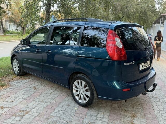 Синий Мазда 5, объемом двигателя 2 л и пробегом 299 тыс. км за 3305 $, фото 3 на Automoto.ua