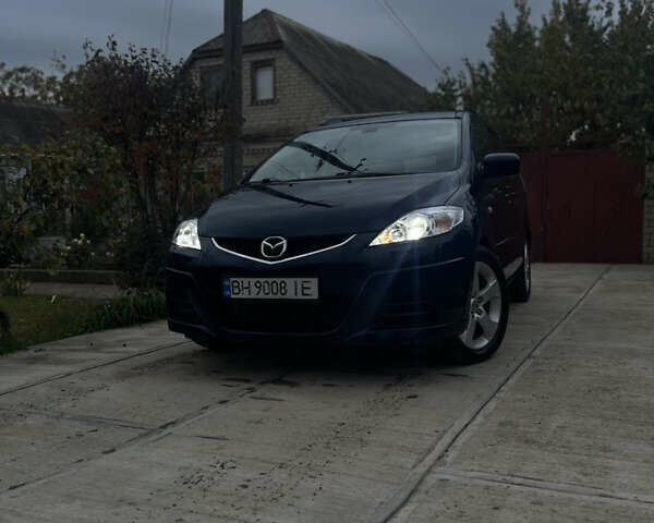 Синий Мазда 5, объемом двигателя 2 л и пробегом 363 тыс. км за 6100 $, фото 1 на Automoto.ua