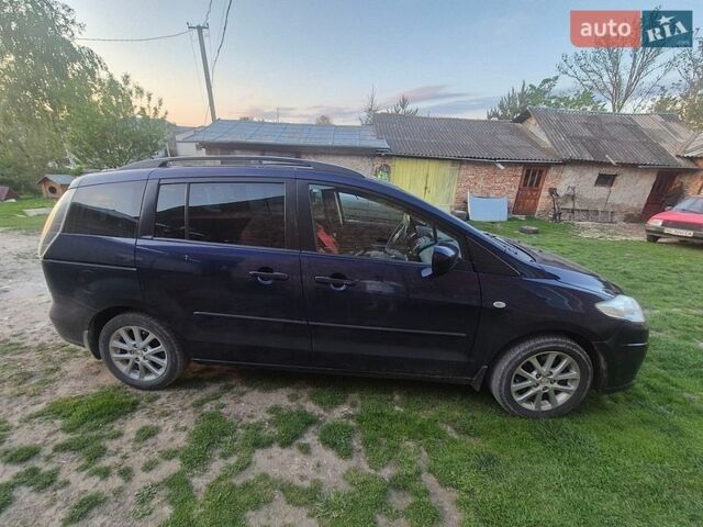 Синий Мазда 5, объемом двигателя 1.8 л и пробегом 211 тыс. км за 6300 $, фото 1 на Automoto.ua