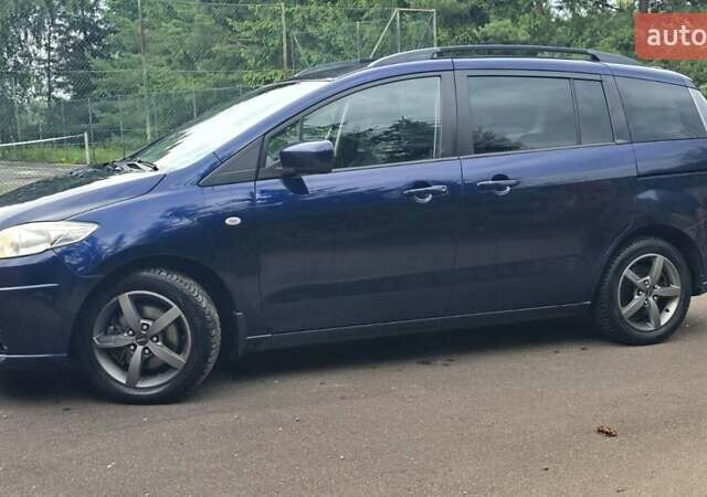 Синий Мазда 5, объемом двигателя 2 л и пробегом 240 тыс. км за 6300 $, фото 1 на Automoto.ua
