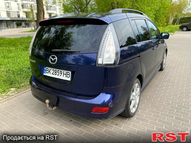 Синий Мазда 5, объемом двигателя 2 л и пробегом 279 тыс. км за 6300 $, фото 2 на Automoto.ua