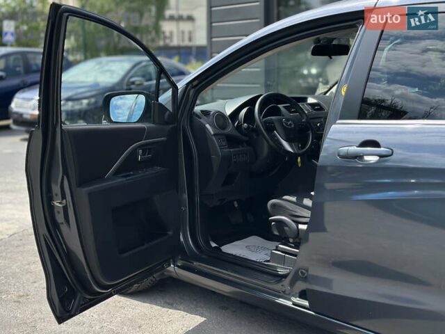 Синий Мазда 5, объемом двигателя 2 л и пробегом 190 тыс. км за 8200 $, фото 20 на Automoto.ua