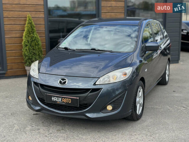 Синий Мазда 5, объемом двигателя 2 л и пробегом 190 тыс. км за 8200 $, фото 1 на Automoto.ua