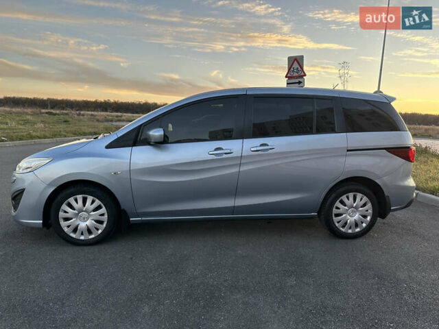 Синий Мазда 5, объемом двигателя 2 л и пробегом 140 тыс. км за 7999 $, фото 5 на Automoto.ua