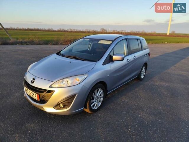 Синий Мазда 5, объемом двигателя 1.8 л и пробегом 98 тыс. км за 9000 $, фото 10 на Automoto.ua