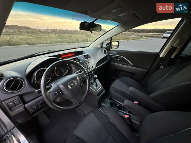 Синий Мазда 5, объемом двигателя 2 л и пробегом 140 тыс. км за 7999 $, фото 21 на Automoto.ua