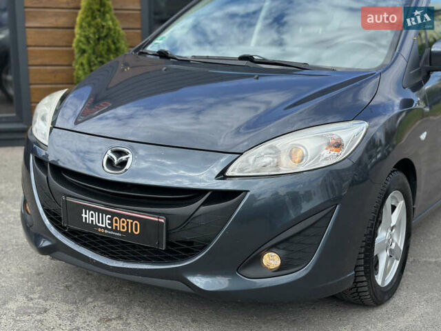 Синий Мазда 5, объемом двигателя 2 л и пробегом 190 тыс. км за 8200 $, фото 2 на Automoto.ua