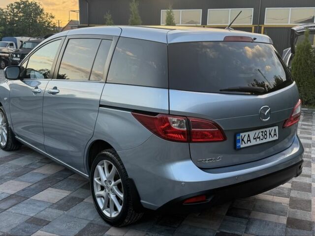Синий Мазда 5, объемом двигателя 2 л и пробегом 217 тыс. км за 7518 $, фото 3 на Automoto.ua
