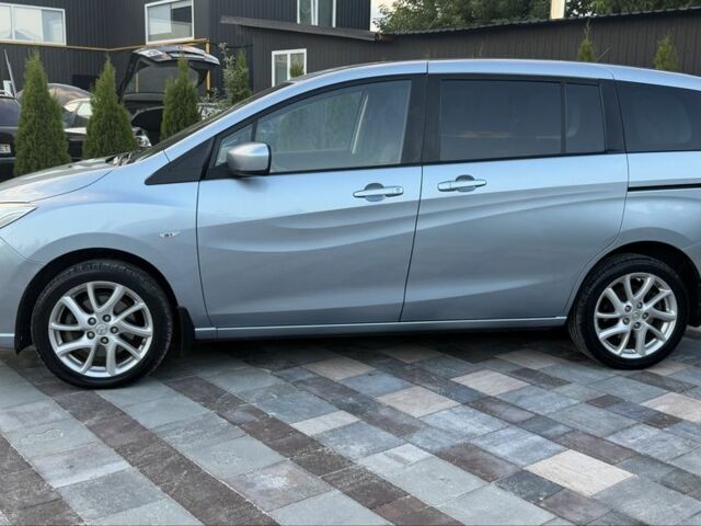 Синий Мазда 5, объемом двигателя 2 л и пробегом 217 тыс. км за 7518 $, фото 4 на Automoto.ua