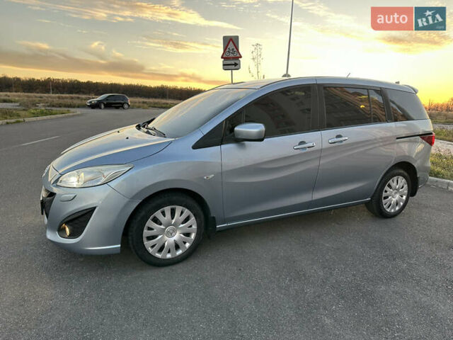 Синий Мазда 5, объемом двигателя 2 л и пробегом 140 тыс. км за 7999 $, фото 4 на Automoto.ua