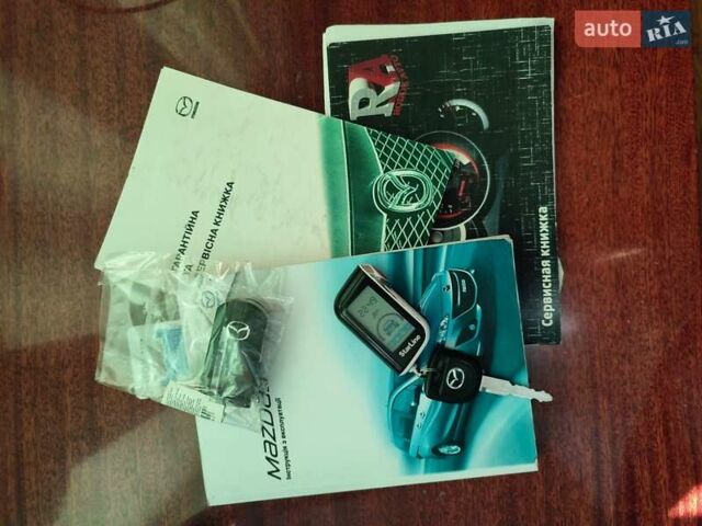 Синий Мазда 5, объемом двигателя 2 л и пробегом 103 тыс. км за 10599 $, фото 1 на Automoto.ua