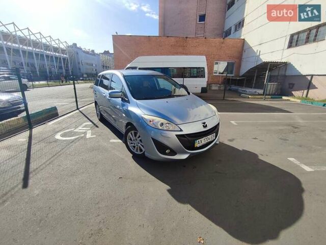 Синий Мазда 5, объемом двигателя 2 л и пробегом 103 тыс. км за 10599 $, фото 5 на Automoto.ua