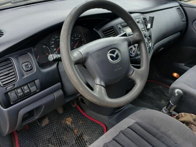 Зеленый Мазда 5, объемом двигателя 2 л и пробегом 300 тыс. км за 2600 $, фото 6 на Automoto.ua