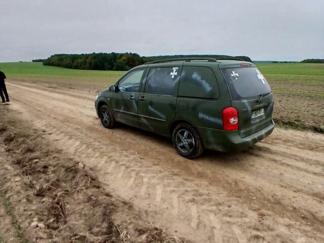 Зеленый Мазда 5, объемом двигателя 2 л и пробегом 300 тыс. км за 2600 $, фото 4 на Automoto.ua